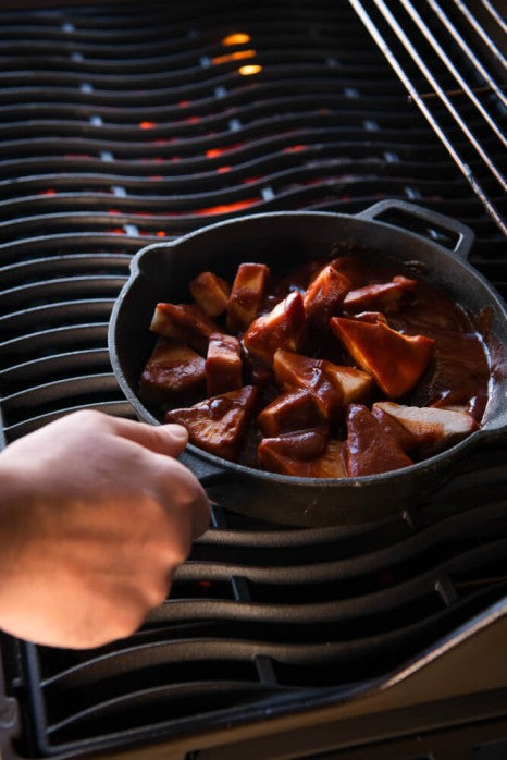 Napoleon 9.5-inch porcelain-coated cast iron frying pan with pour spouts